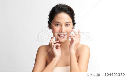 Beautiful young asian woman with clean fresh skin on white background, Face care, Facial treatment, Cosmetology, beauty and spa, Asian women portrait. 104491370