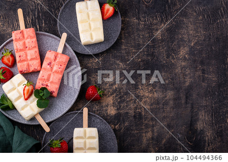 Strawberry ice cream pop sicle with mint Strawberry ice cream pop sicle with mint 104494366