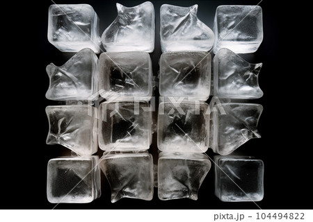 Melting ice cubes over black background. Top view. Generative AI Melting ice cubes over black background. Top view. Generative AI 104494822