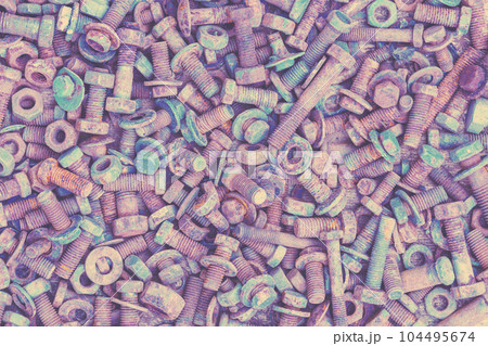 Abstract grunge metal background from old rusty bolts, screws, nuts and washers 104495674