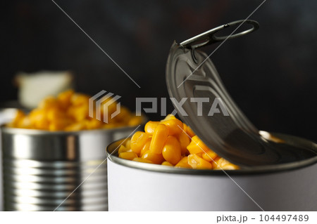 Canned food in blank metal jars, concept of canned food Canned food in blank metal jars, concept of canned food 104497489