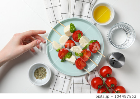 Concept of tasty Italian cuisine food - Caprese salad 104497852