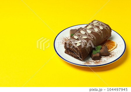 Concept of delicious sweet food - cake roll 104497945