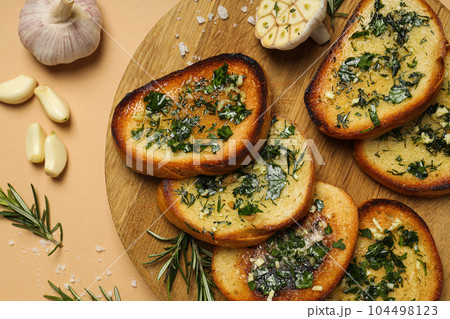 Tasty toasts with garlic, homemade products appetizer Tasty toasts with garlic, homemade products appetizer 104498123