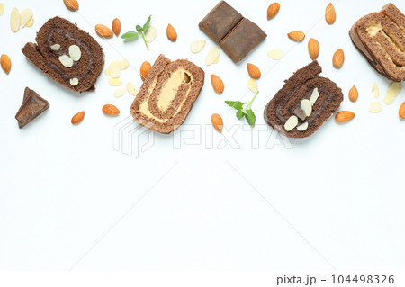 Concept of delicious sweet food - cake roll Concept of delicious sweet food - cake roll 104498326