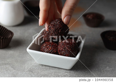 Traditional brazilian sweet - Brigadeiro, brazilian Chocolate candy Traditional brazilian sweet - Brigadeiro, brazilian Chocolate candy 104498358