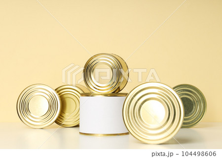 Canned food in blank metal jars, concept of canned food Canned food in blank metal jars, concept of canned food 104498606