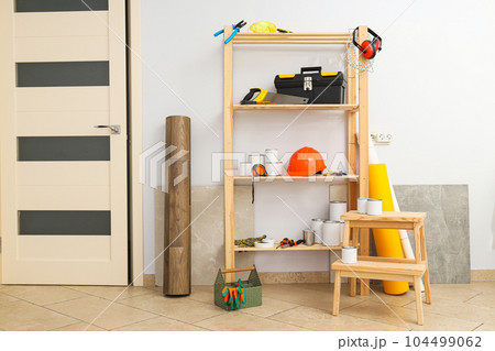 Concept of different work accessories, engineering supplies and tools 104499062