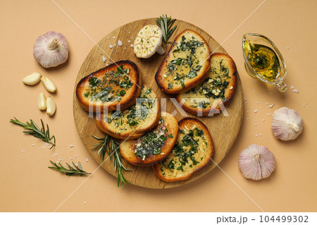 Tasty toasts with garlic, homemade products appetizer 104499302