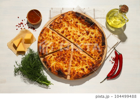 National Georgian cuisine food, flour product - Khachapuri 104499488