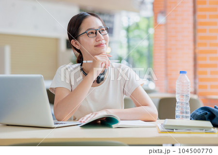 Asian student university teen woman happy thinking new idea creativity learning education concept. Asian student university teen woman happy thinking new idea creativity learning education concept. 104500770
