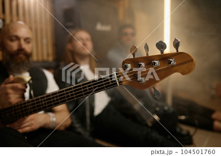 Funky rock band musician rest after rehearsal repetition portrait Funky rock band musician rest after rehearsal repetition portrait 104501760