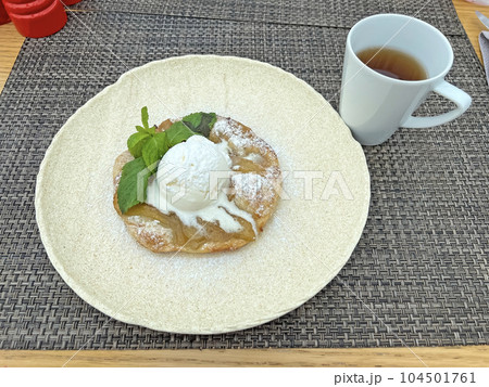 Hot pear pie with vanilla ice cream Hot pear pie with vanilla ice cream 104501761