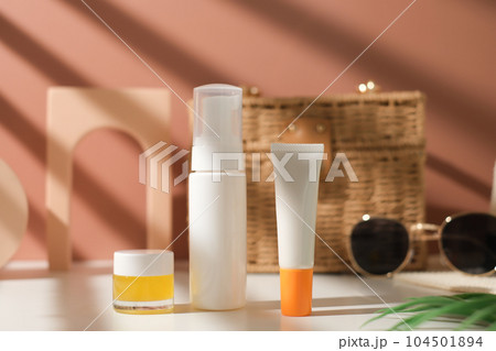 mock up skincare and suncare packaging including bottle, tube, and jar. summer beauty and fashion concept. mock up skincare and suncare packaging including bottle, tube, and jar. summer beauty and fashion concept. 104501894