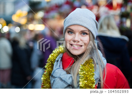 Woman posing on Christmas market Woman posing on Christmas market 104502893