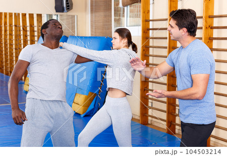 People fighting with coach at gym 104503214