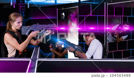 Two laser tag teams playing indoors 104503499