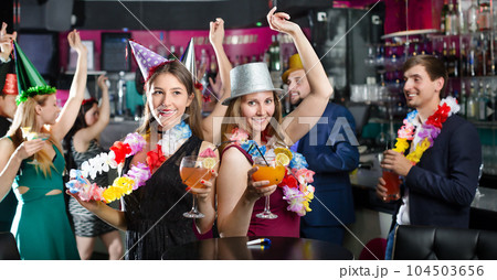 Young friends dancing on birthday party Young friends dancing on birthday party 104503656