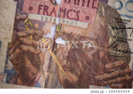 Closeup of vintage bank note of fifty francs Closeup of vintage bank note of fifty francs 104505434