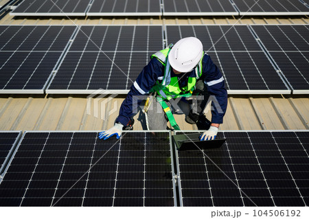 Professional engineer technician with safety helmet checking system Professional engineer technician with safety helmet checking system 104506192
