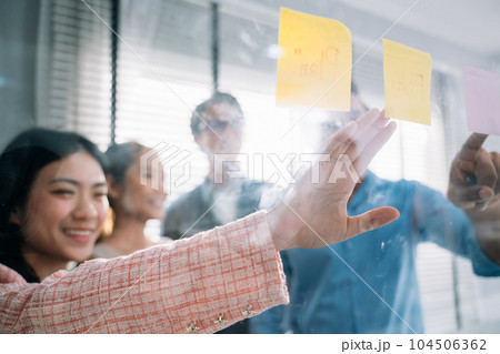 Group of business people working together at modern office 104506362