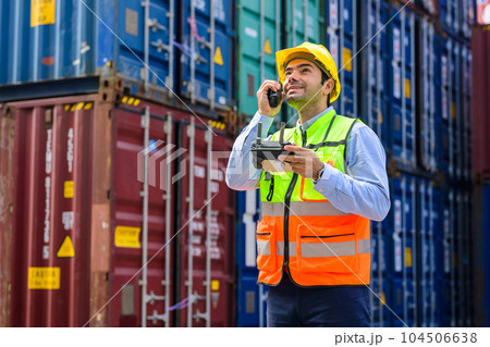 Warehouse engineer worker working at industrial container yard Warehouse engineer worker working at industrial container yard 104506638