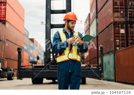 Warehouse engineer worker working at industrial container yard 104507119