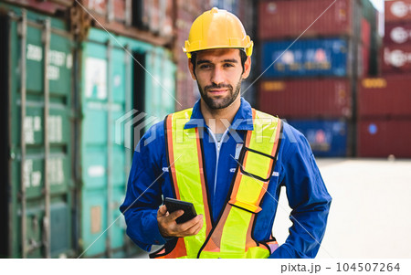 Professional industrial engineer worker working at container cargo yard 104507264