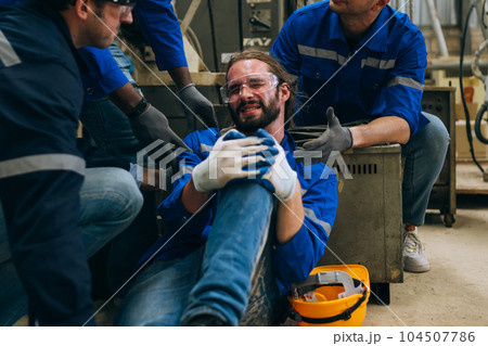 Hardworking engineer worker with accident at factory Hardworking engineer worker with accident at factory 104507786