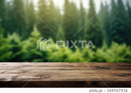 The empty wooden table top with blur background of boreal forest. Exuberant. 104507916