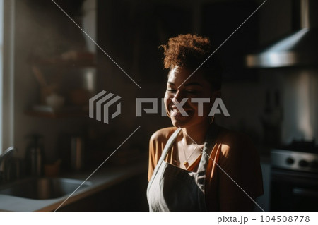 Female African american adult cooking in kitchen apron chef attire. Generative AI AIG23. 104508778
