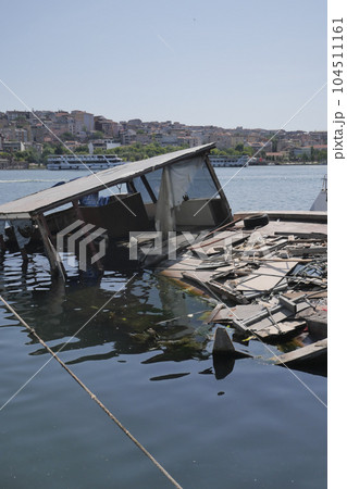 Stranded fishing boats on water , 104511161