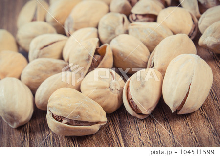 Pistachio nuts containing vitamins and minerals. Healthy eating Pistachio nuts containing vitamins and minerals. Healthy eating 104511599