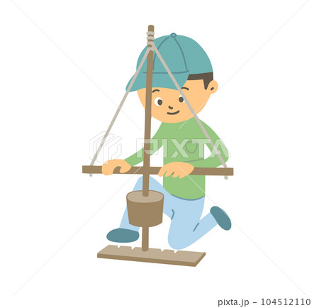 キャンプで火起こし道具を使って火を起こそうとする子ども 104512110