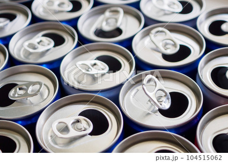 Empty aluminium drink cans recycling background concept Empty aluminium drink cans recycling background concept 104515062