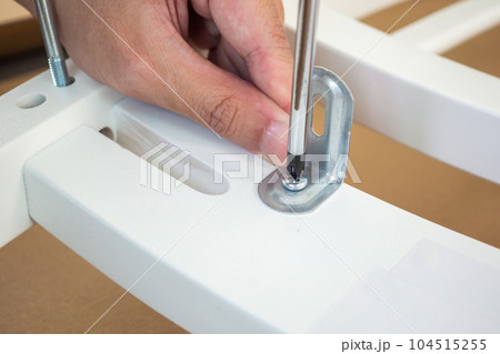 Assembly furniture using screwdriver at home Assembly furniture using screwdriver at home 104515255