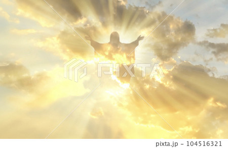 Jesus Christ In The Clouds Of Heaven gold sky background Jesus Christ In The Clouds Of Heaven gold sky background 104516321
