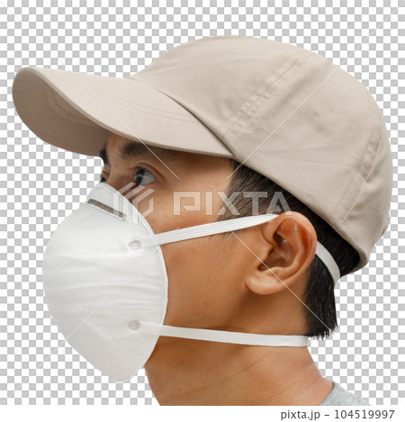 Close up of young male wearing protective face mask on white background. Close up of young male wearing protective face mask on white background. 104519997
