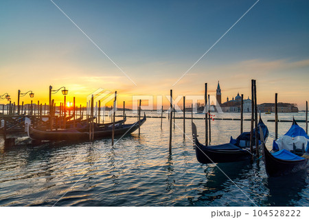 View of San Giorgio Maggiore Island with gondolas from San Marco View of San Giorgio Maggiore Island with gondolas from San Marco 104528222