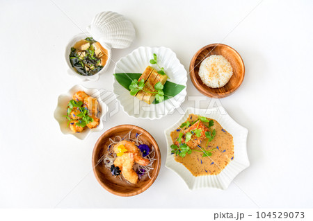 Set of Japanese dishes: miso soup, tamago, tempura shrimp, rice Set of Japanese dishes: miso soup, tamago, tempura shrimp, rice 104529073