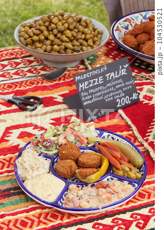 Selection of Palestinian dishes at the street food market in Prague 104530521