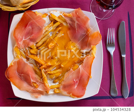 Scrambled eggs with bacon and french fries Scrambled eggs with bacon and french fries 104534328
