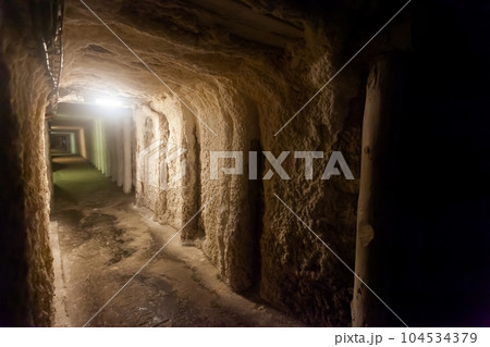 Illuminated tunnels in old mines 104534379