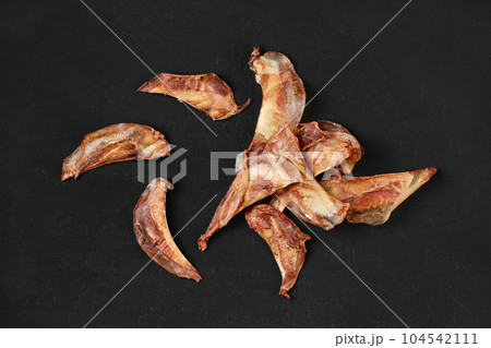 Top view of natural dried treats for dogs 104542111
