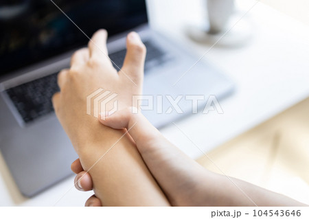 Concept of Carpal Tunnel Syndrome,De Quervain's Tenosynovitis,Office Syndrome,occupational disease,work with laptop computer,typing on keyboard for long period of time,health illness problems Concept of Carpal Tunnel Syndrome,De Quervain's Tenosynovitis,Office Syndrome,occupational disease,work with laptop computer,typing on keyboard for long period of time,health illness problems 104543646