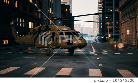 military helicopter in downtown at sunset 104545300
