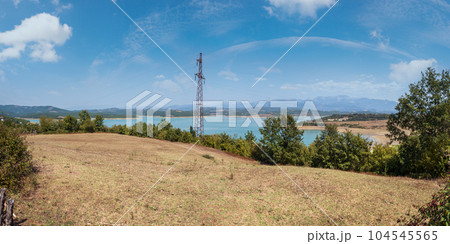 Summer Ulza Lake view from mountain road in Diber County, Balkan mountains, Albania, Europe. 104545565