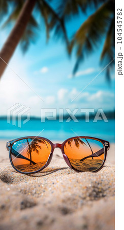 Sunglasses on the Sand at the Beach 104545782