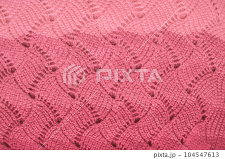 Handmade knitted background with detail woven threads. Handmade knitted background with detail woven threads. 104547613