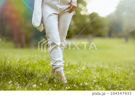 Closeup on woman walking Closeup on woman walking 104547935